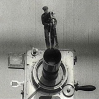 Логотип man_with_a_movie_camera